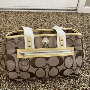 Coach Daisy Tote bag In Khaki And Brown Signature Jacquard with yellow  accents.
